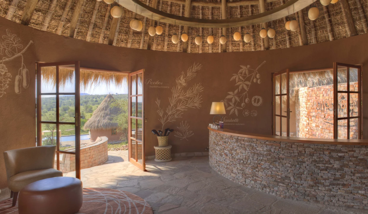 Interior of a round room with decorated walls.