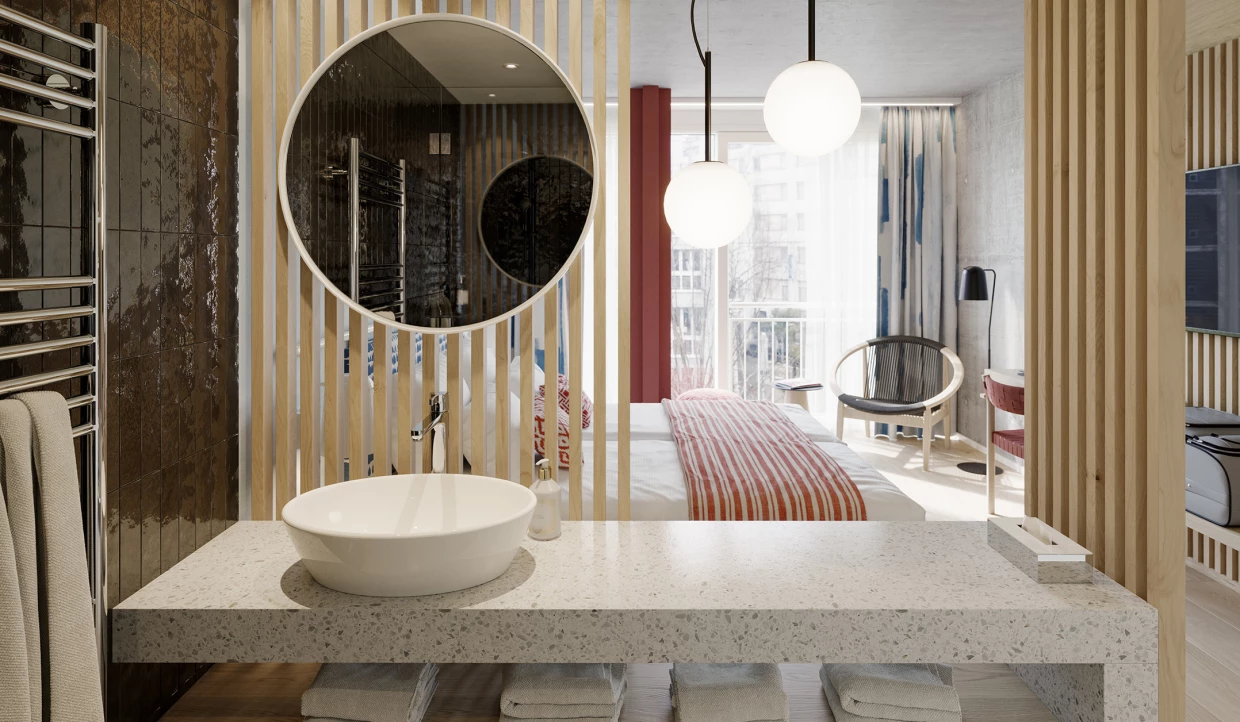 Bathroom with vanity, round mirror, and view into bedroom