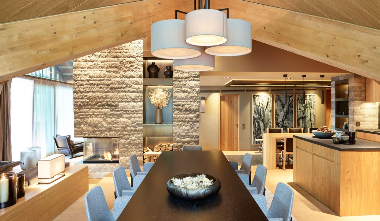Dining room with large table and fireplace