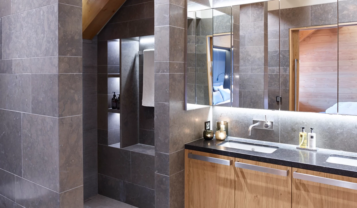 Modern bathroom with wood and stone elements